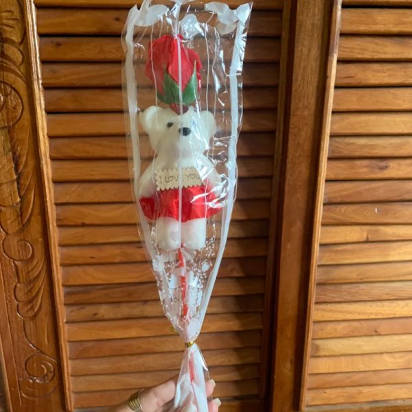 Osito de peluche con flor
