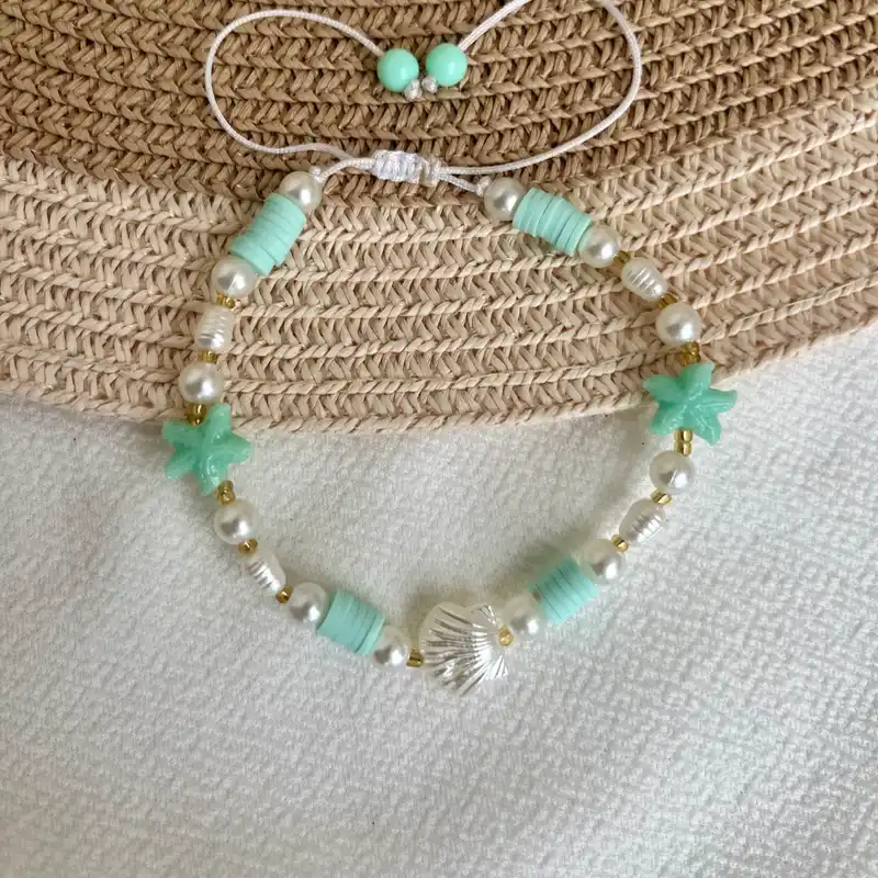 Tobillera de fimos , perlas y estrellas de mar