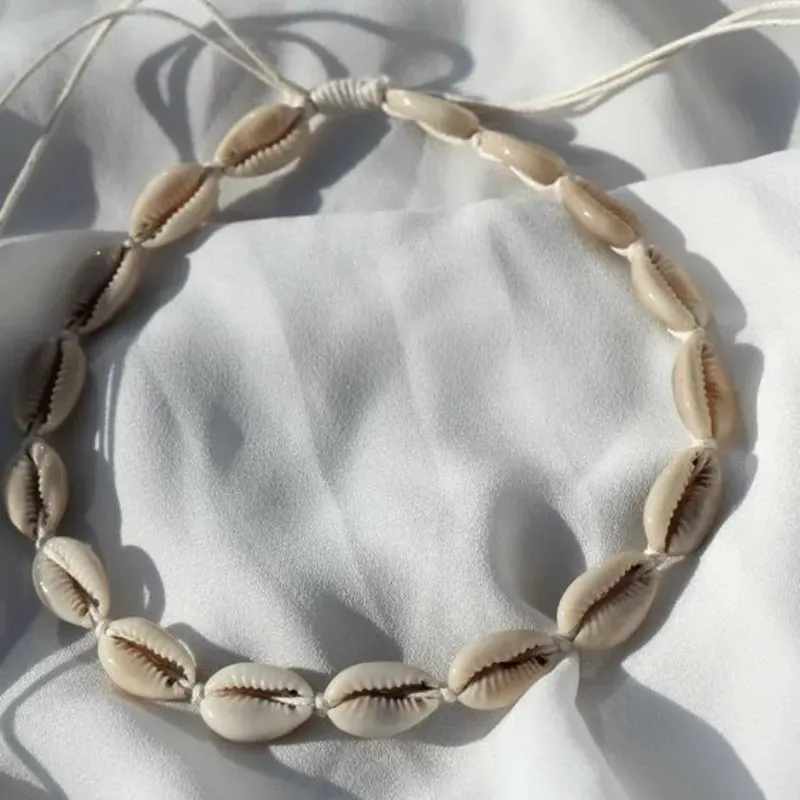 Collar de caracol caruy