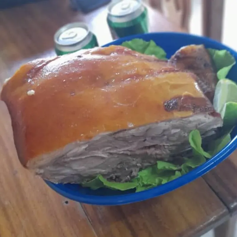 Cerdo asado por libras