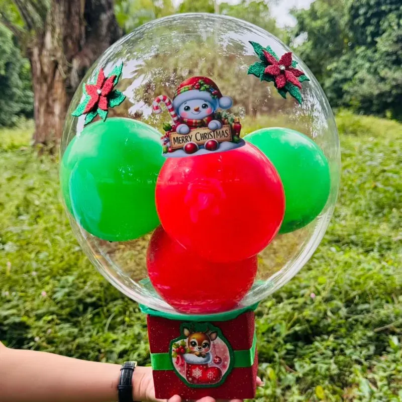 Globo burbuja con caja surtida (bombones de chocolate, malvadiscos,caramelo y chupa chupa)