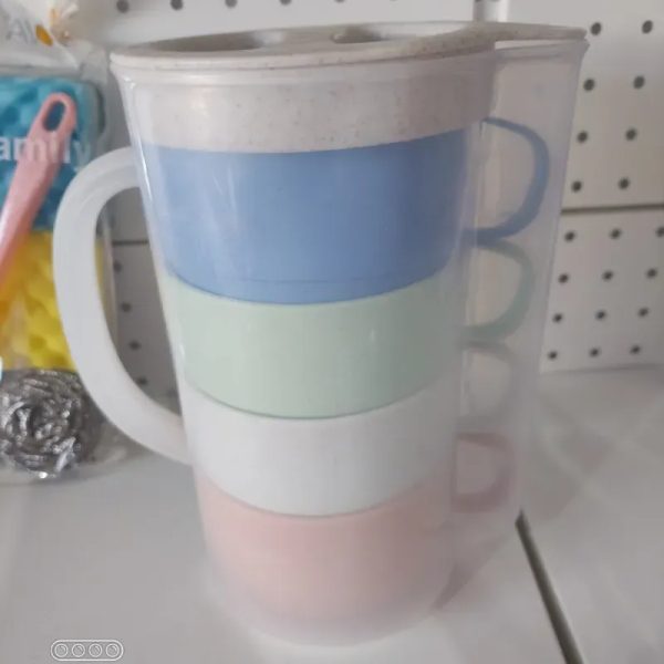 Juego de jarra con taza
