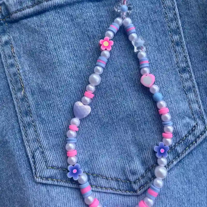 Colgante de celular de perlas y fimos