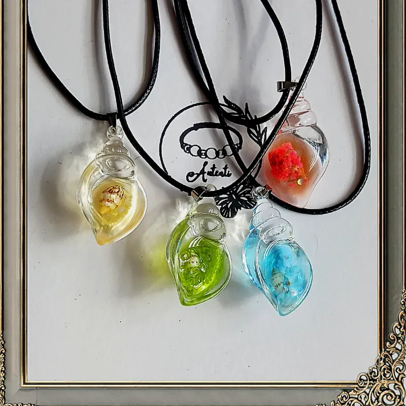 Colgante de caracoles flourecentes