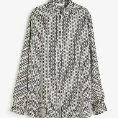 Camisa satinada oversize