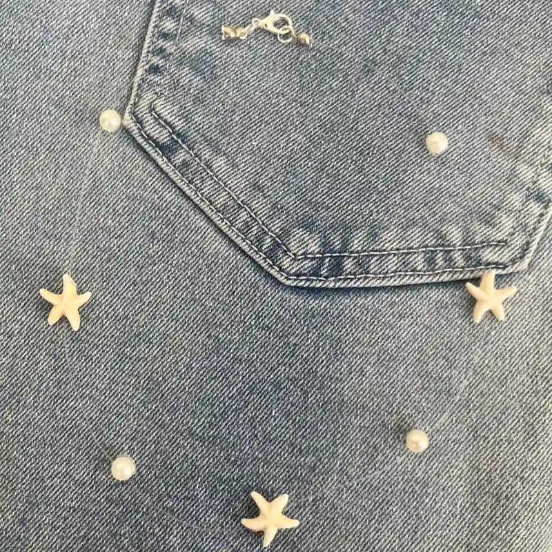 Fantasmita con estrellas de mar y perlas