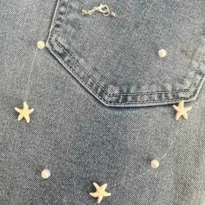 Fantasmita con estrellas de mar y perlas