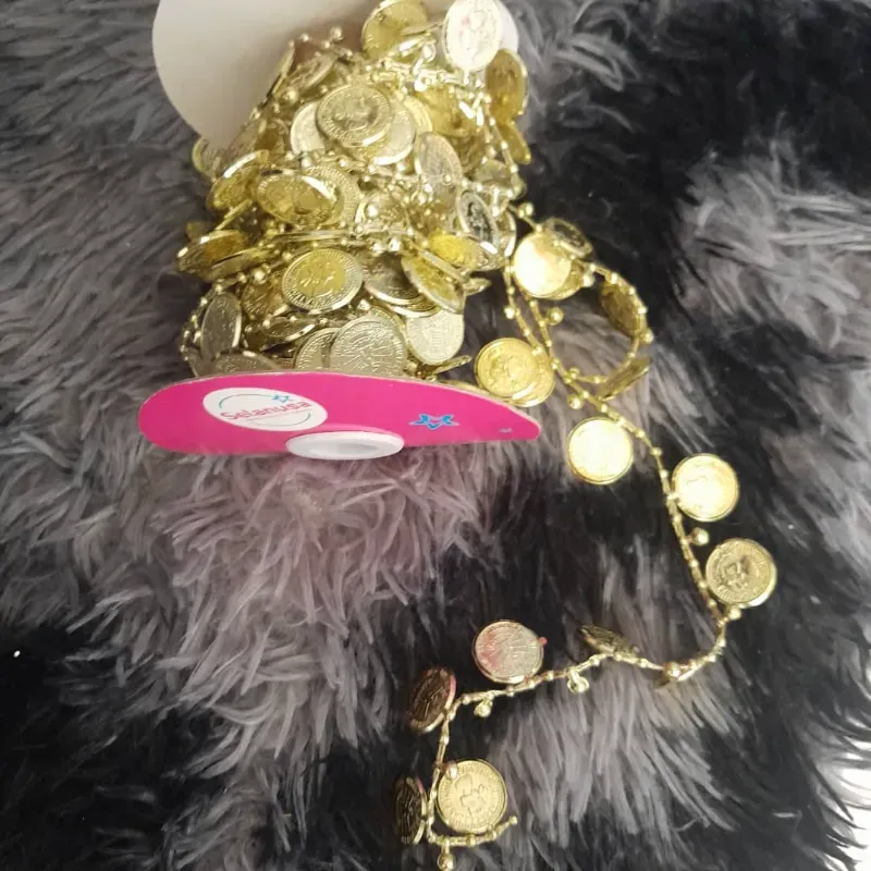 Tira de monedas doradas