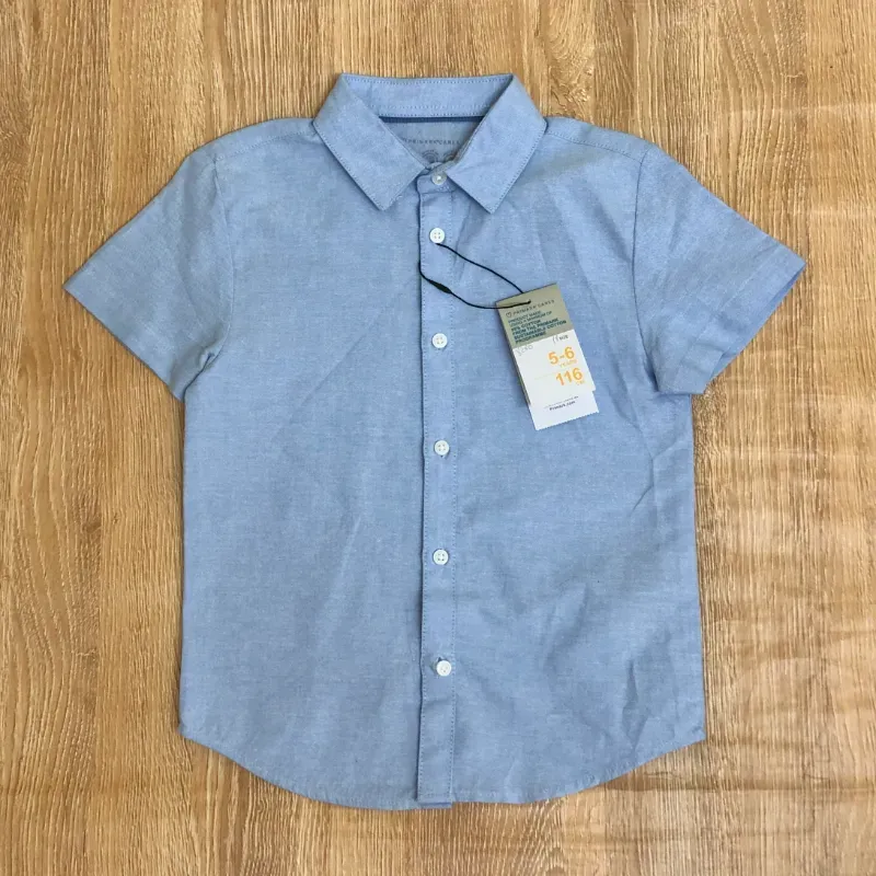 Camisa azul de mangas cortas
