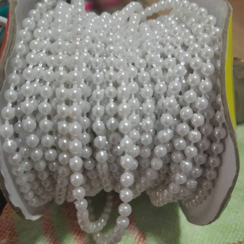 Tira perlas  blancas