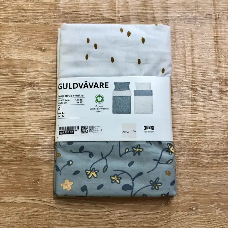 Set de funda y sábanas reversibles color azul y blanco