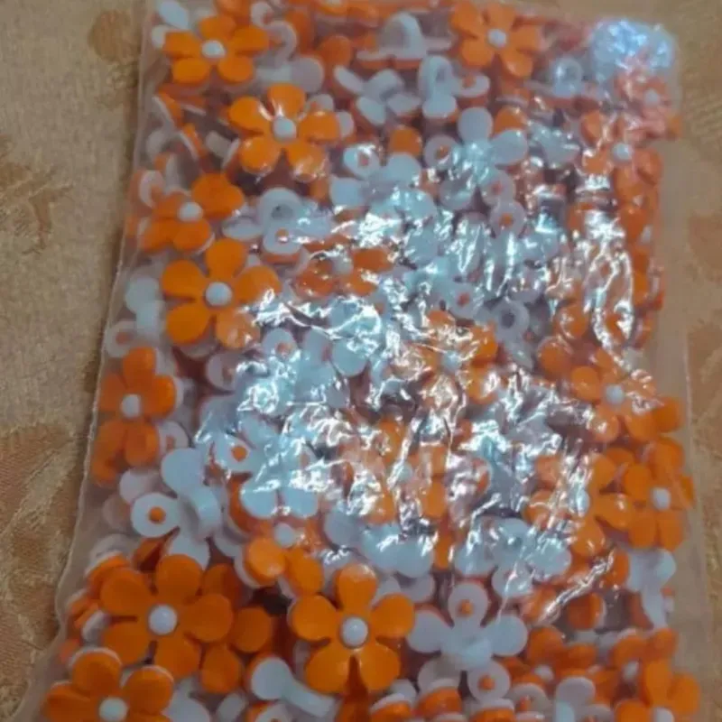 Botón forma de floresita