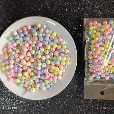 Perla plástica multicolor de 6mm