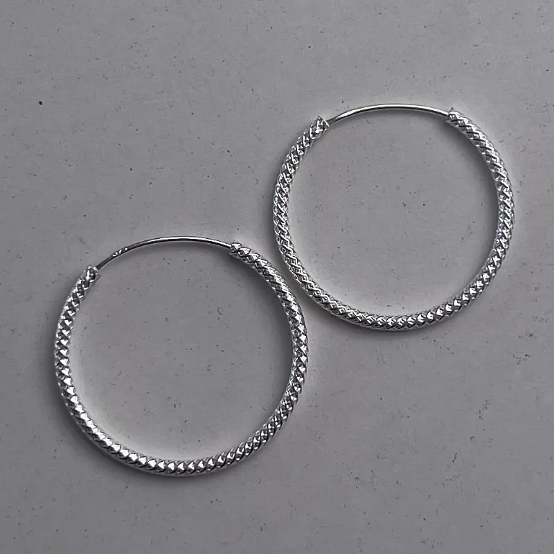 Argollas en textura serpiente originales