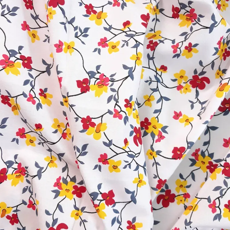 dacron blanco florecitas