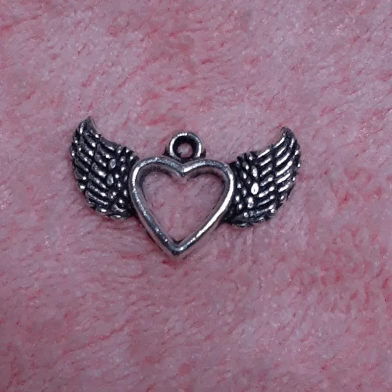Dije Corazón alado
