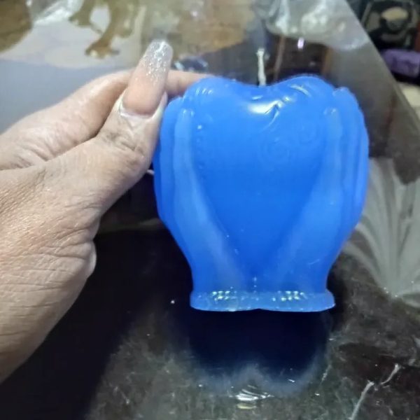 Corazón entre manos