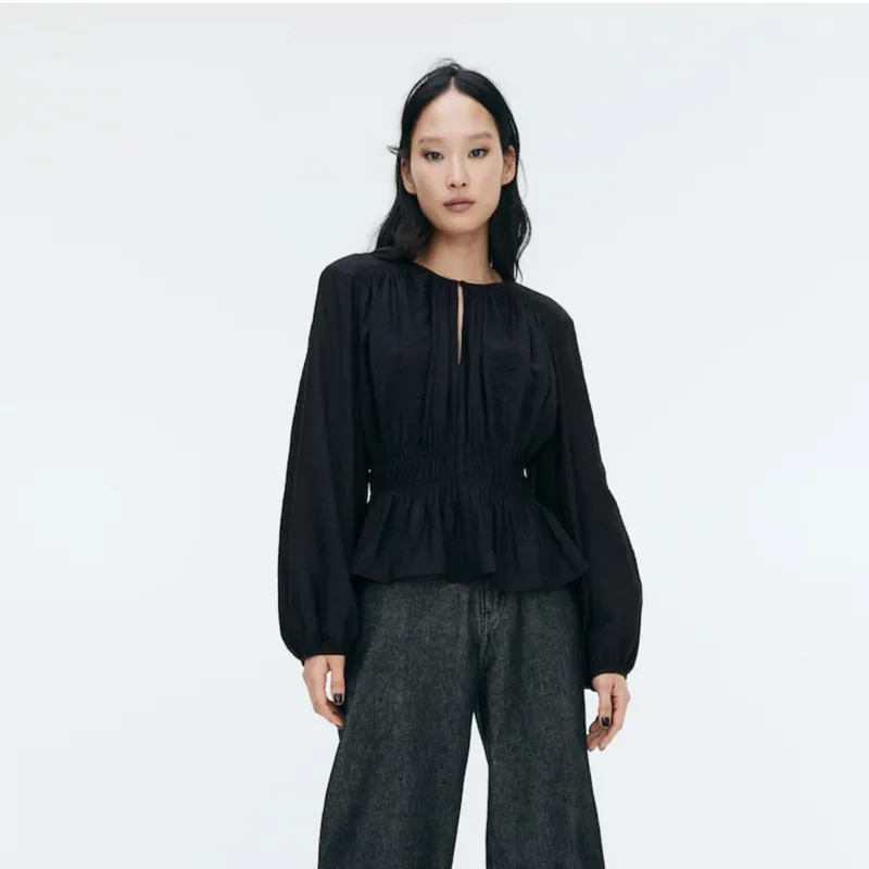 Blusa negra mangas largas