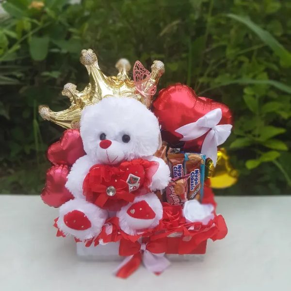 Caja rectangular con peluche