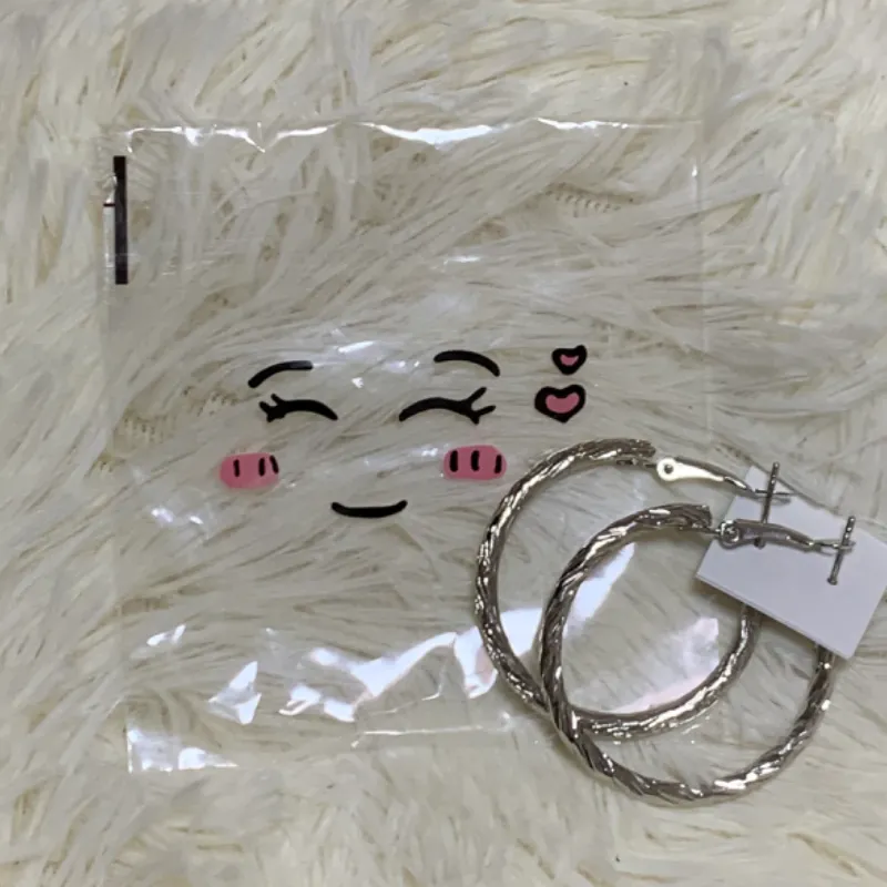 Aretes plateados, modelo #9. 