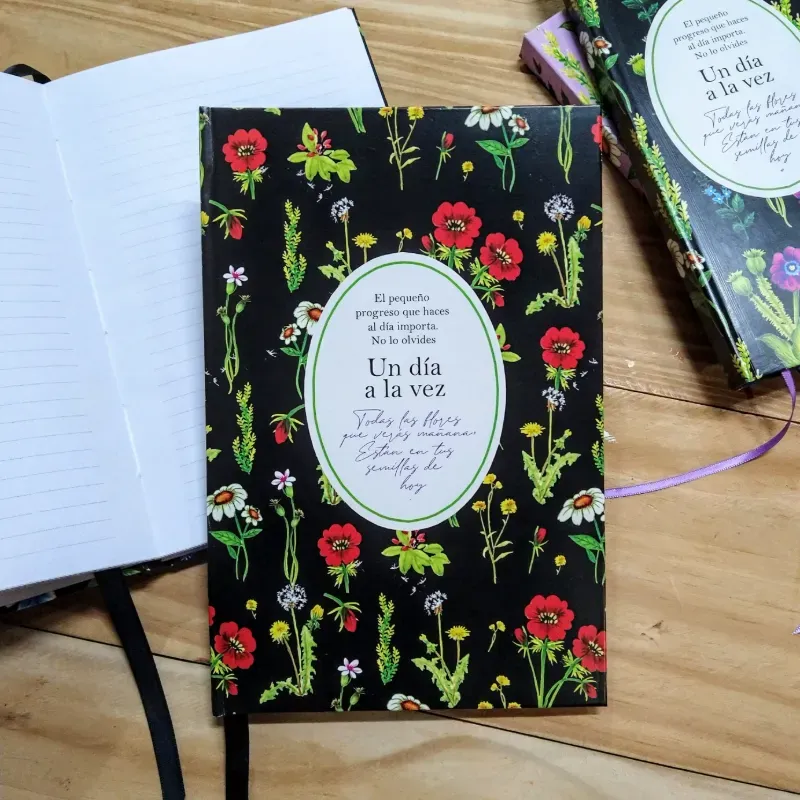 Agenda de flores silvestres rojas con fondo negro