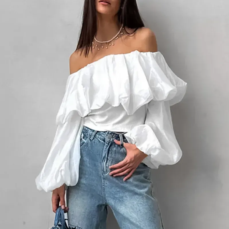 Blusa de mangas blanca y negra