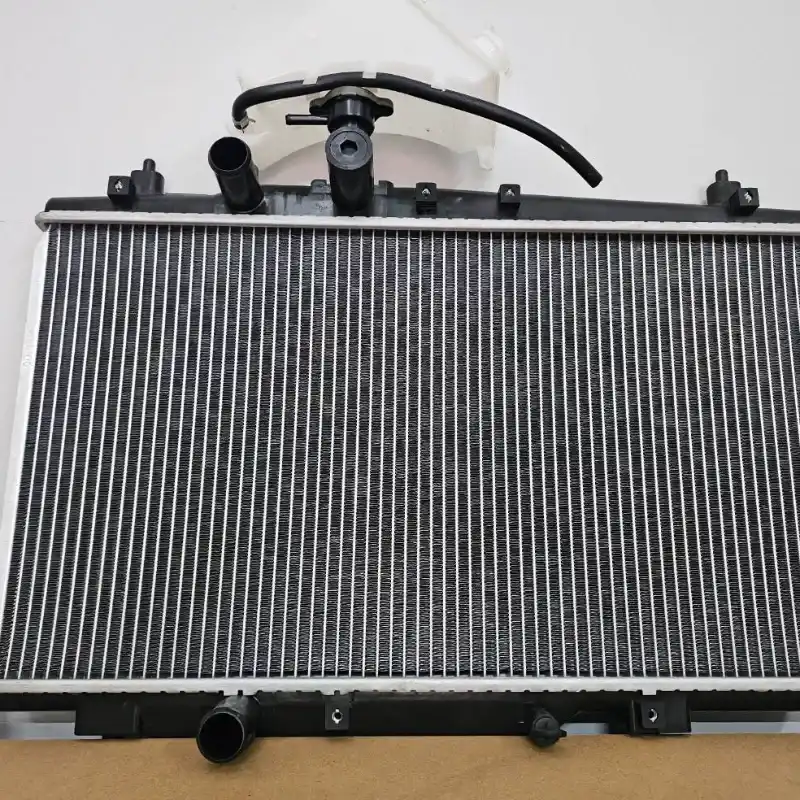 RADIADOR CON DEPOSITO DE AGUA GEELY CK