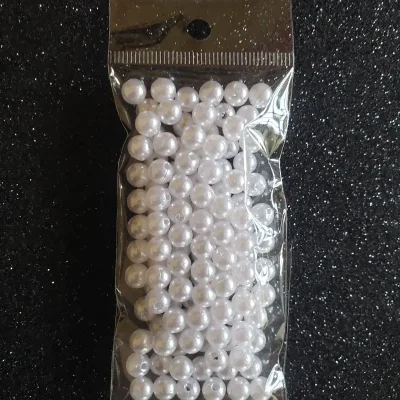Perlas plásticas de 6mm blancas