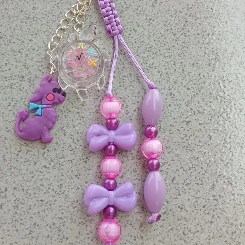 Colgante multiuso con dije marino luminicos.