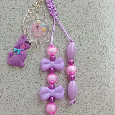 Colgante multiuso con dije marino luminicos.