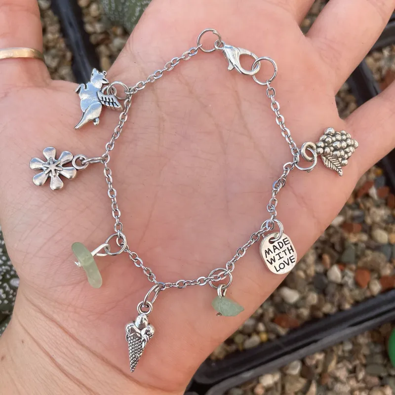 Pulsera de Acero Inoxidable de dijes + piedras naturales.