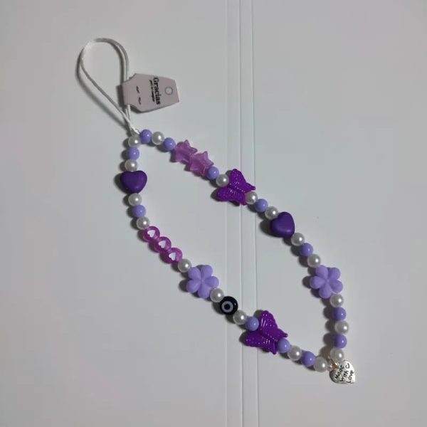 Colgante de telefono morado con ojo turco