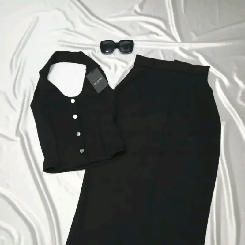 Conjunto chaleco y saya larga