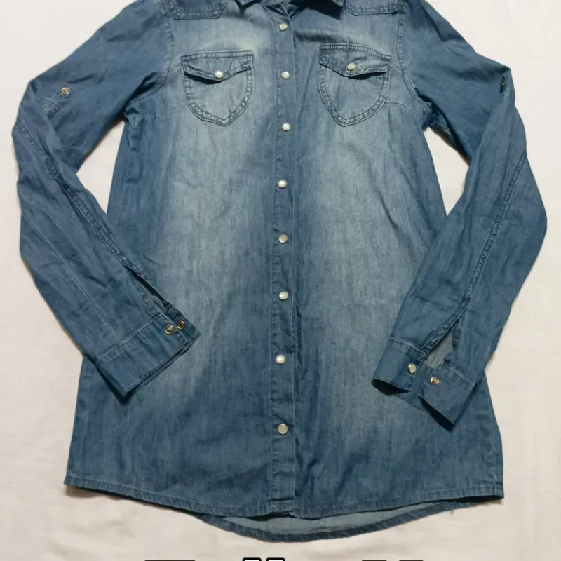 Camisa mangas larga de mezclilla.