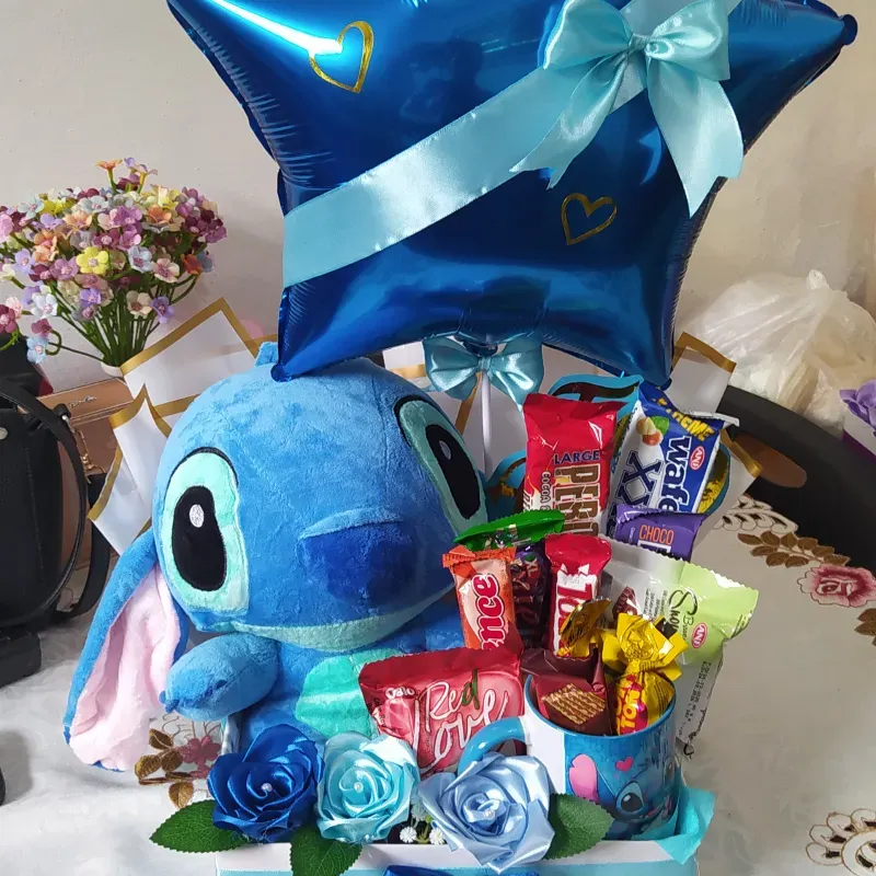 Caja con peluche y globo