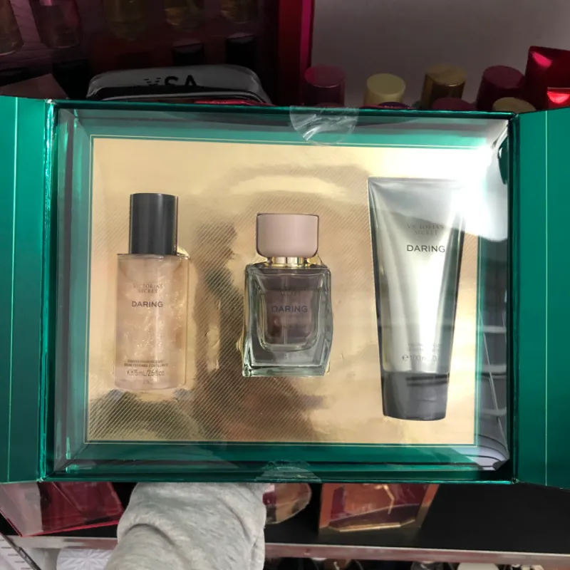 Set de perfume,colonia(shimmer) y crema corporal (Daring)