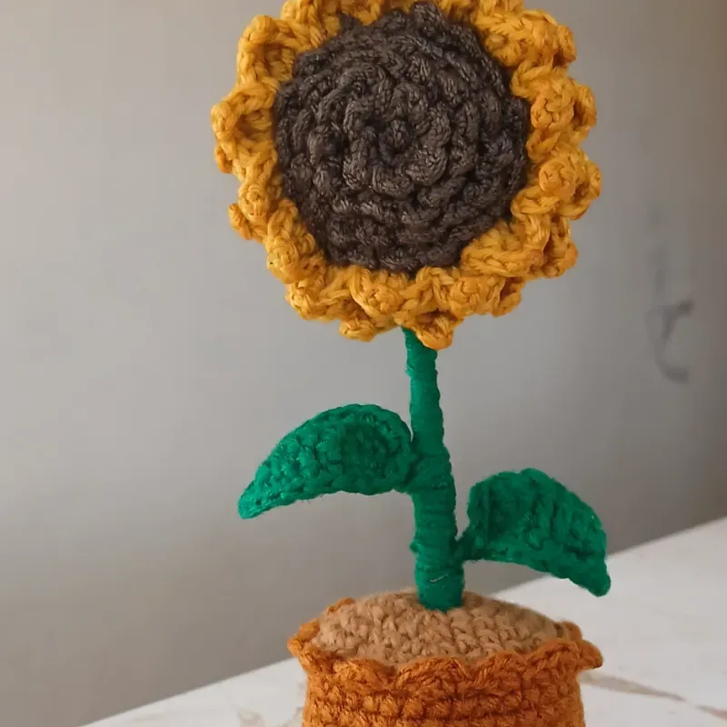 Pote con girasol