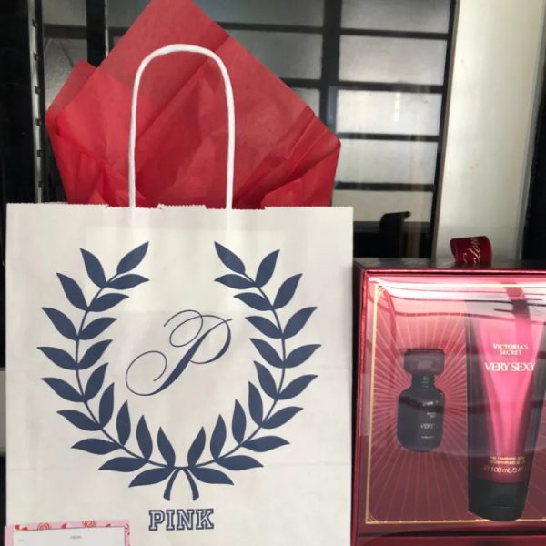 Set de perfume (formato mini ) con su crema corporal