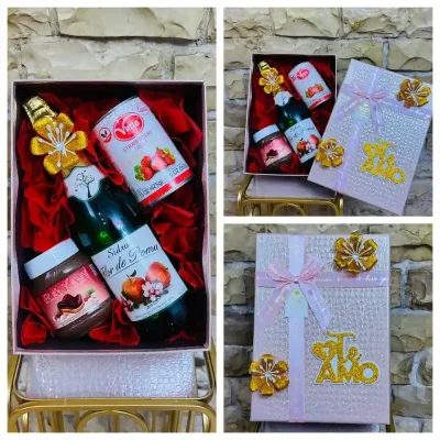 Caja con la combinación perfecta   ( Botella de sidra , Nutella y lata de fresa en almíbar )