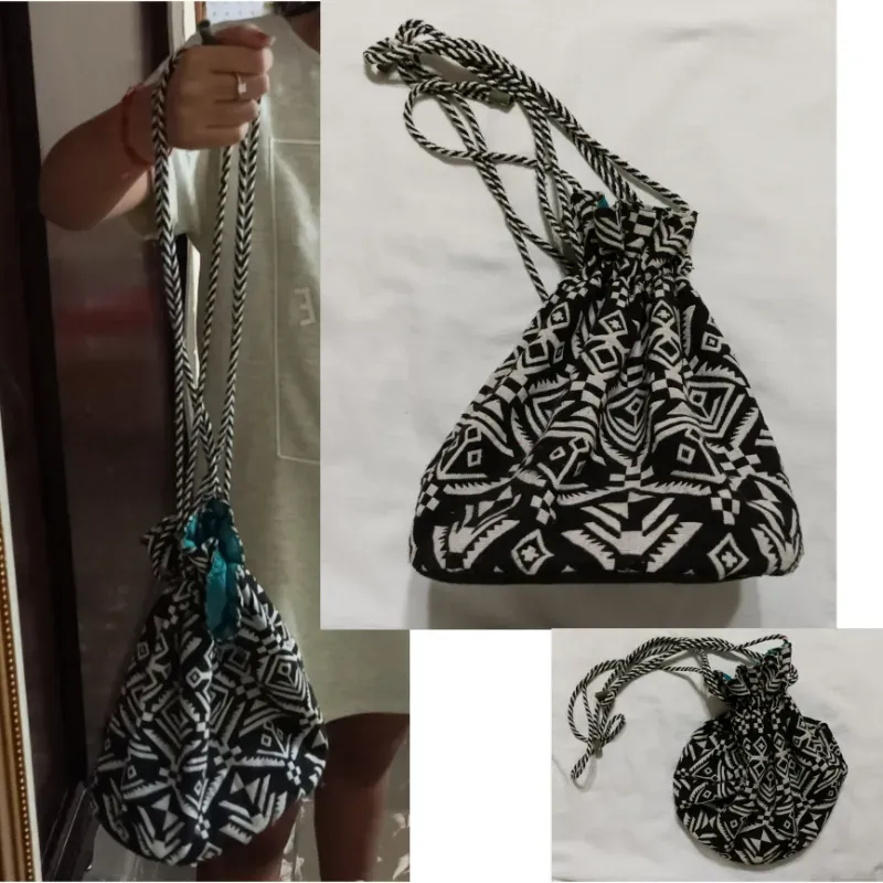 bolso negro y blanco estampado, tipo saquito