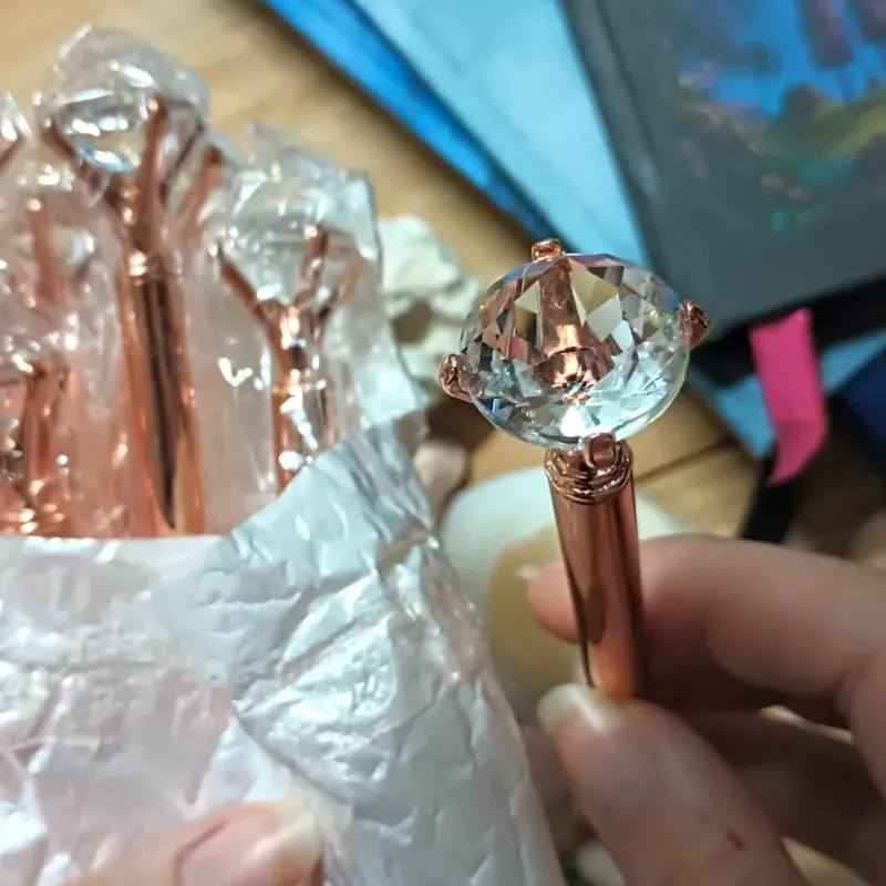 Bolígrafos de diamante y oro rosa