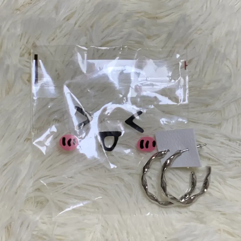 Aretes plateados, modelo #10. 