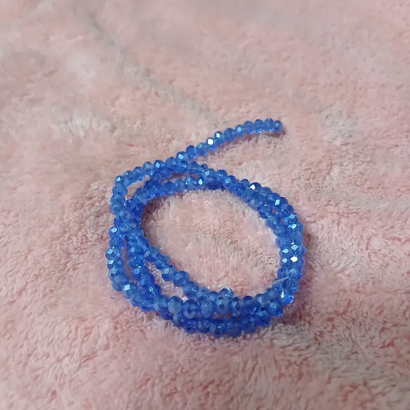 Swaroskis tira 4 mm azul medio transparente