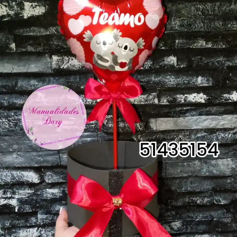 Caja redonda con globo G