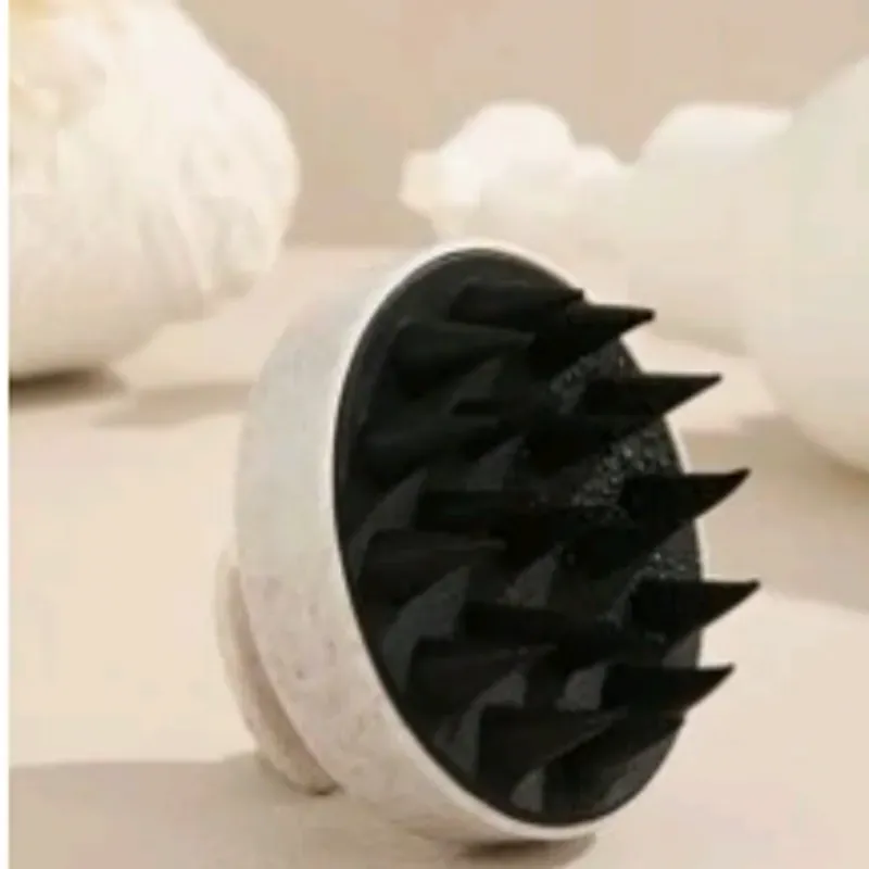 Cepillo masajeador de cuero cabelludo