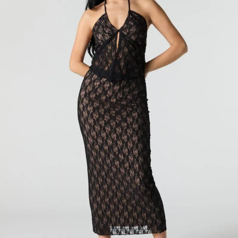 Conjunto negro de encaje top y saya