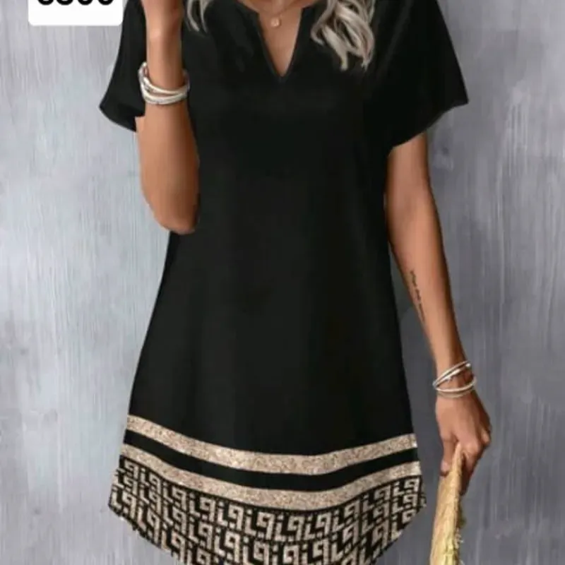 Vestido negro con falso caqui