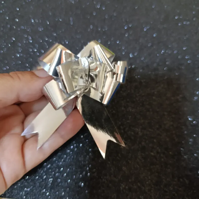  Lazos mágico pequeño plateado 