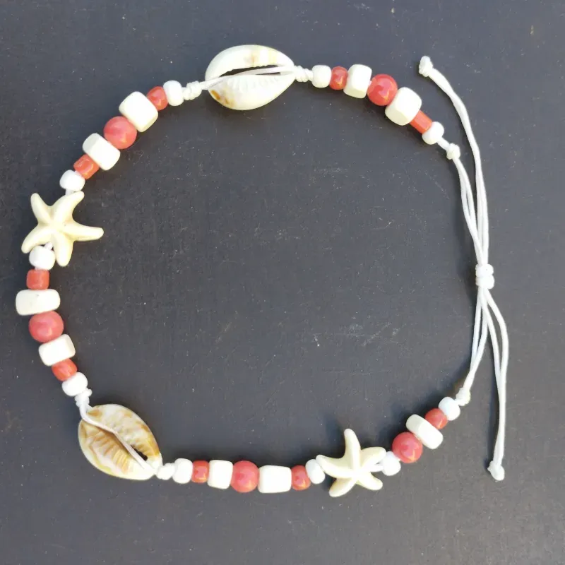 Tobillera roja y blanca