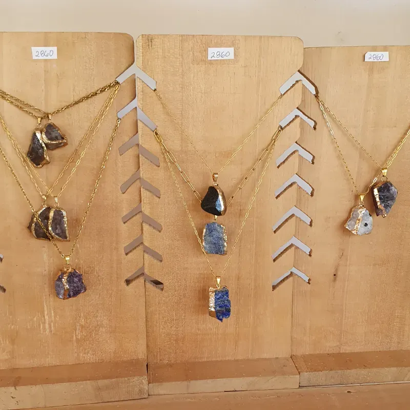 Colgantes de acero y cuarzo